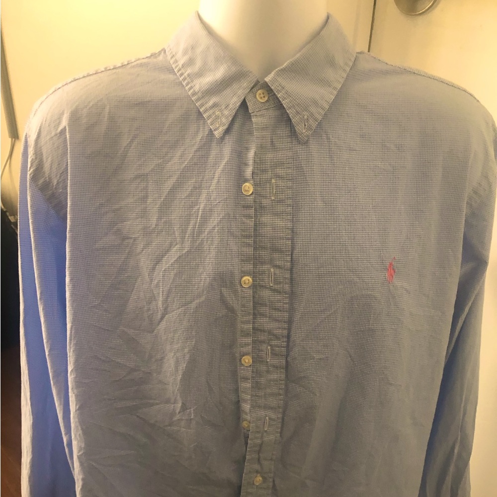 Blue and white checkered polo button down shirt.